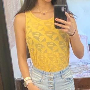Francesca's yellow blouse